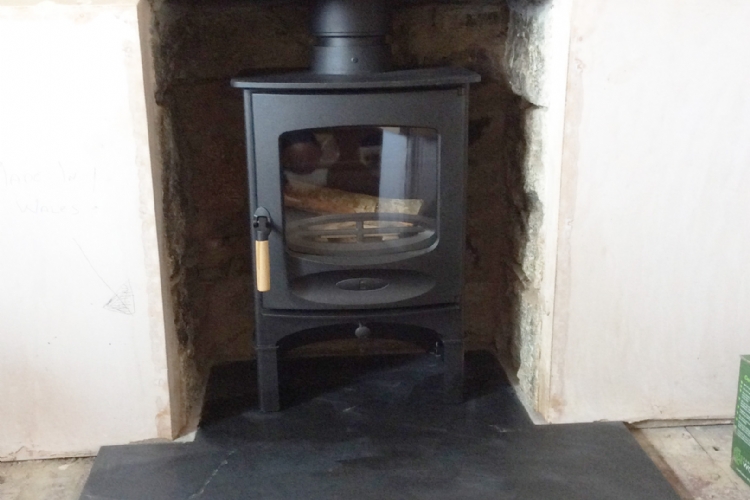 Charnwood C 4 in a stone fireplace