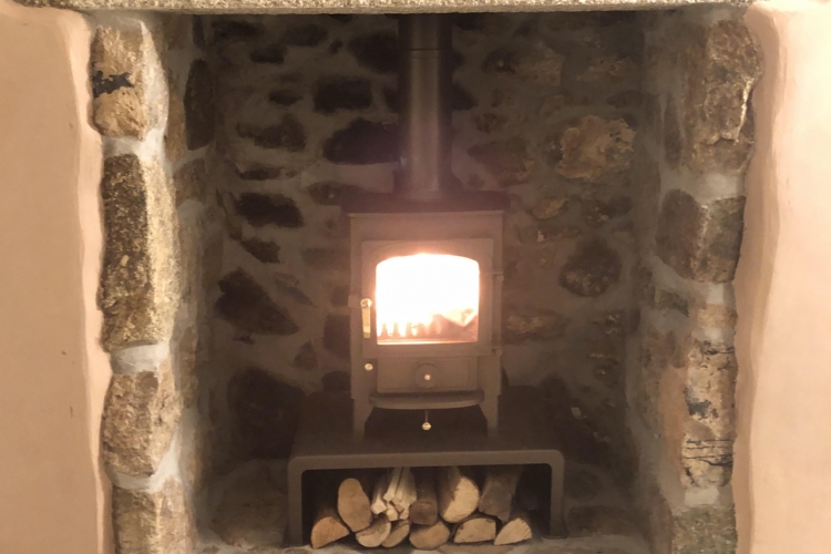 Clearview Pioneer in a traditional Cornish fireplace