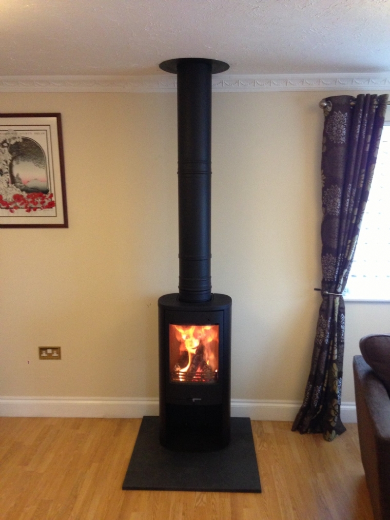 Contura 810 in black wood burning stove installation from Kernow Fires.
