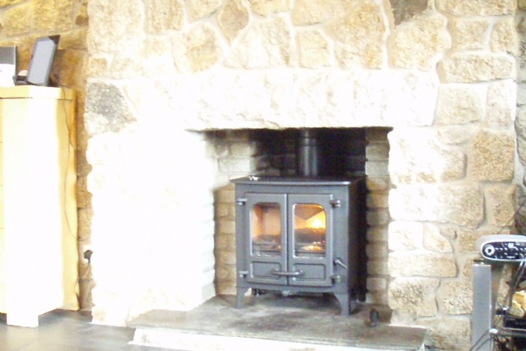 Charnwood Island in a traditional stone fireplace