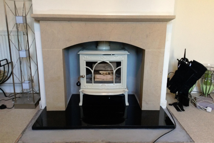 Jotul F100 in a Wessex Stone Fireplace