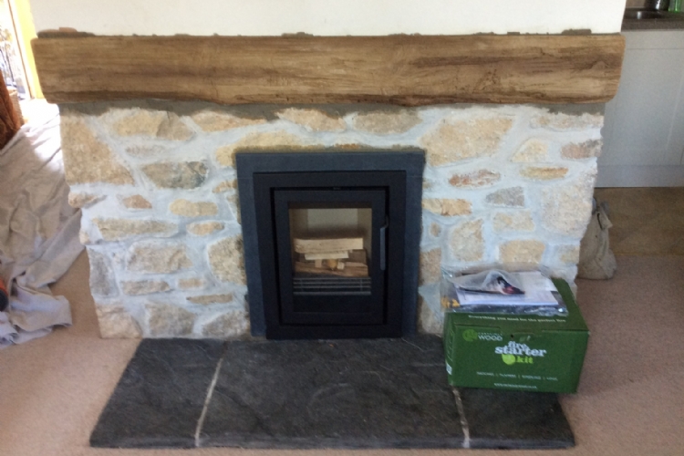 Replacing an open fire in a modernised cottage