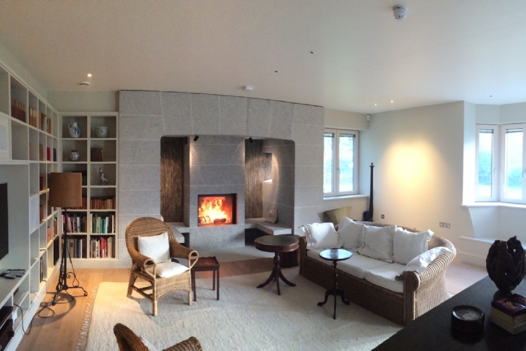 Stuv 21/85 with bespoke granite and slate fireplace