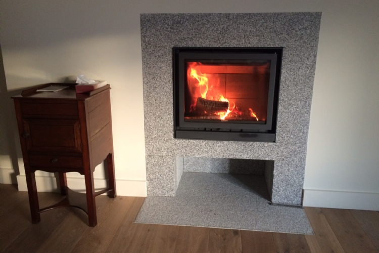 Stuv 16/58 in Bespoke Granite Surround