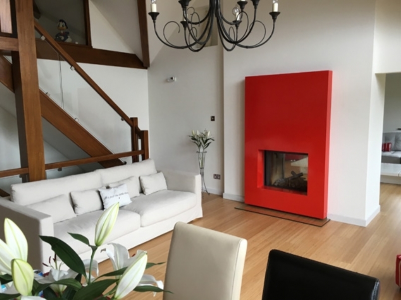 Stuv double sided red fireplace