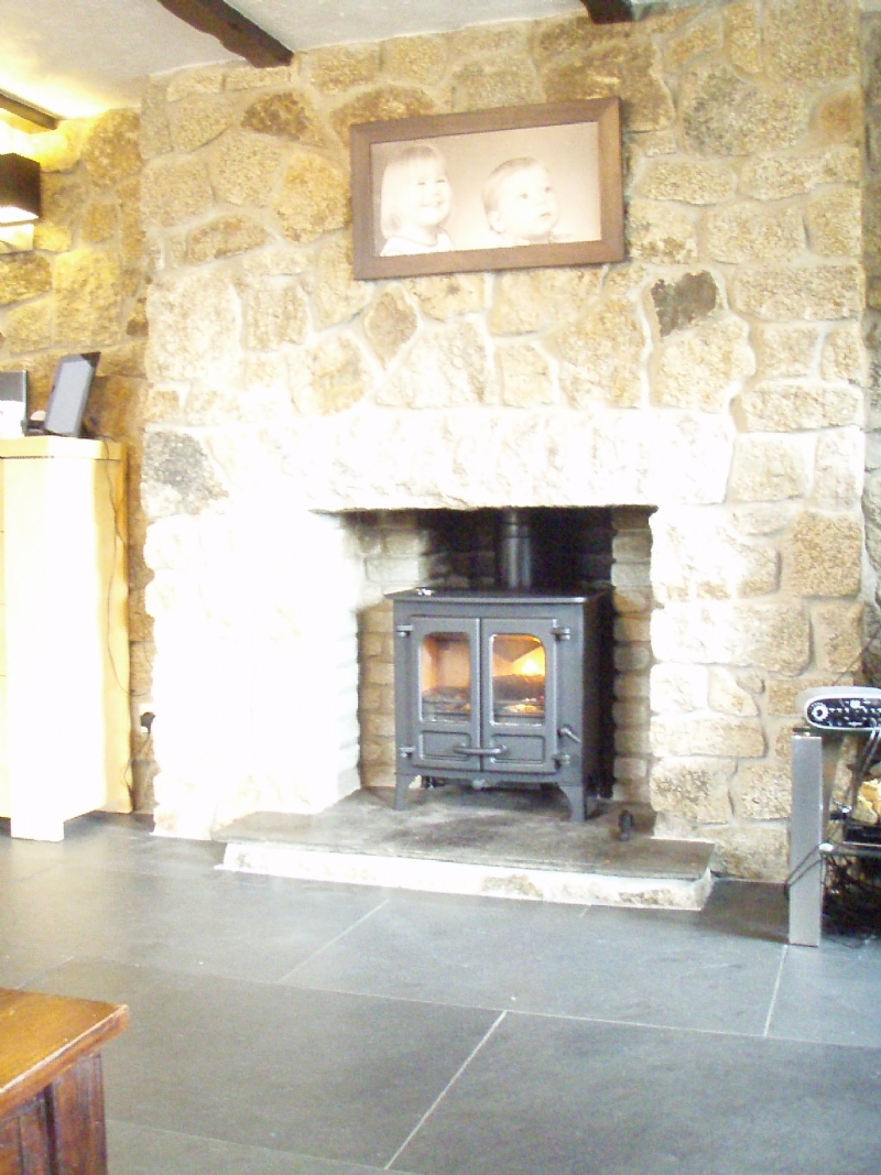 Charnwood Island in a traditional stone fireplace