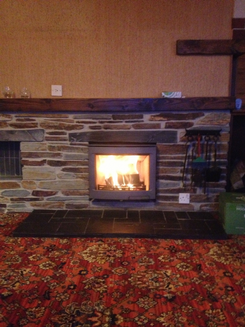 Contura i5 in a traditional slate fireplace