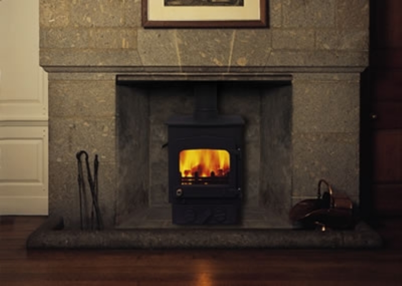 Woodwarm Fireview in a stone mantel