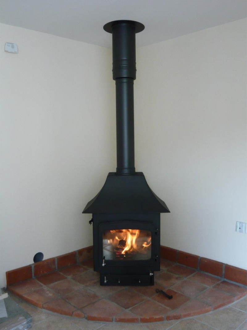 Woodwarm fireview with canopy on a tiled hearth