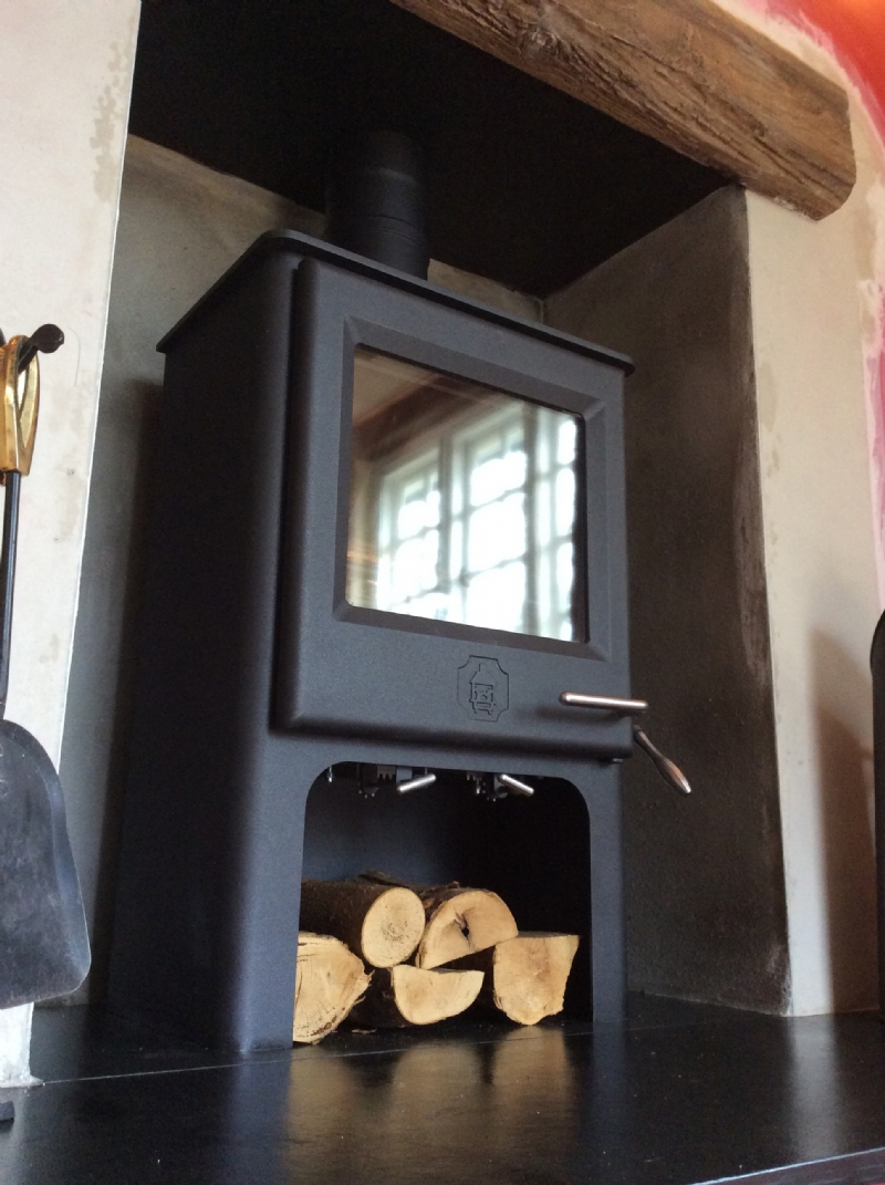 Replacing a fake Victorian fireplace with a wood burning stove