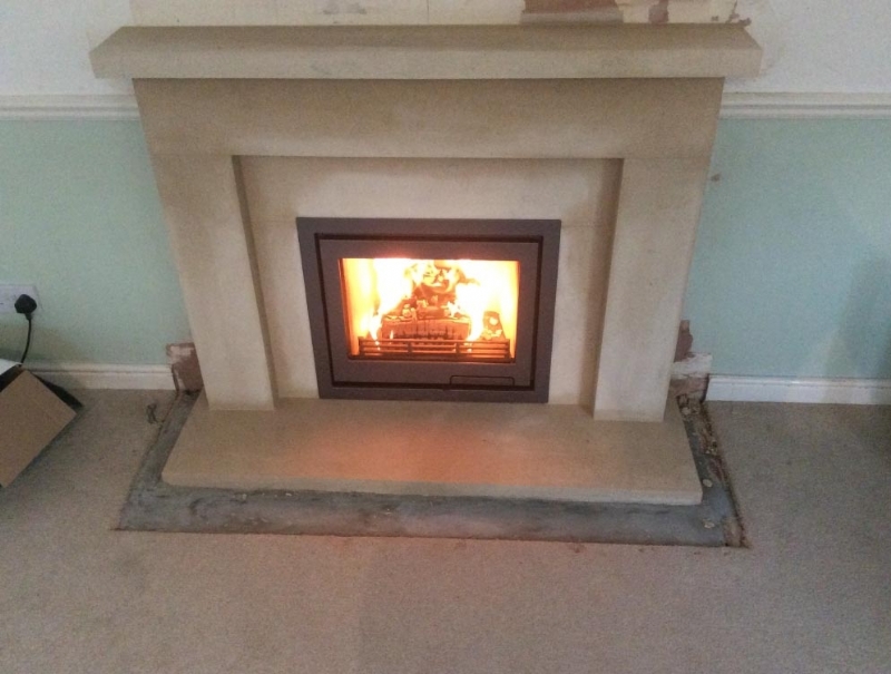 Contura I6 with a Wessex Stone Mantle installed in Cornwall