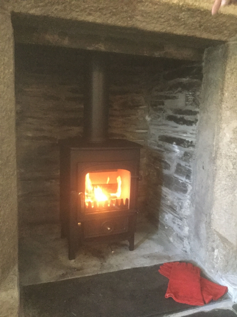 Clearview Pioneer in a Cornish stone fireplace