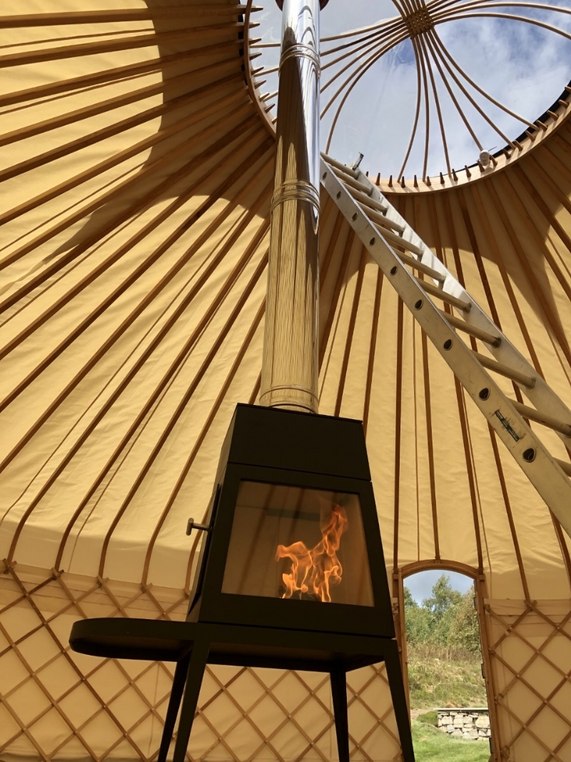 A woodburner in a marquee