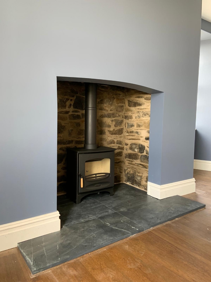 Charnwood C series in a simple fireplace